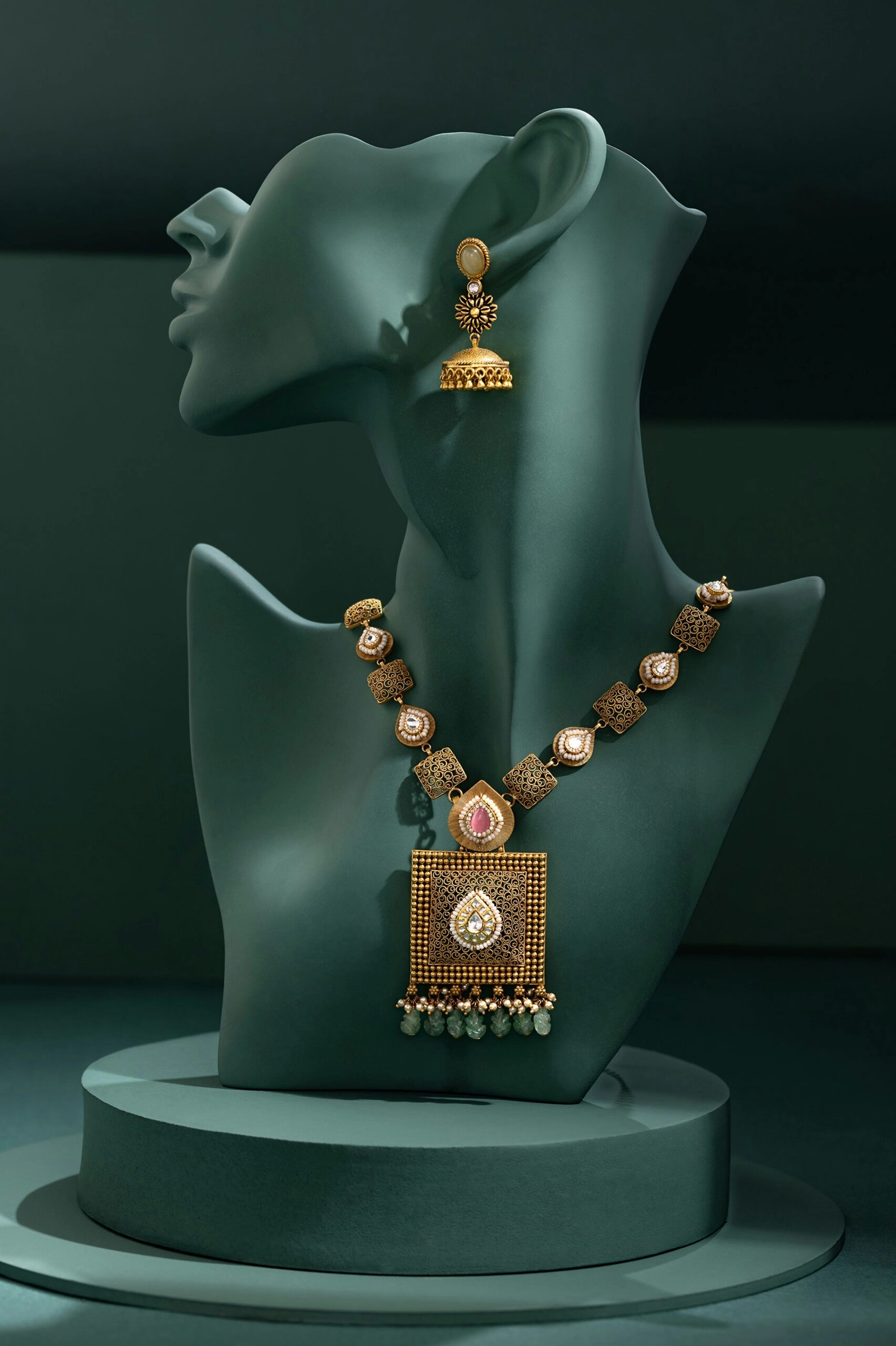 Necklace and earrings on a bust